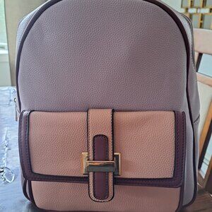 Brand New! Never used! Light Lavendar and pink super soft back pack!